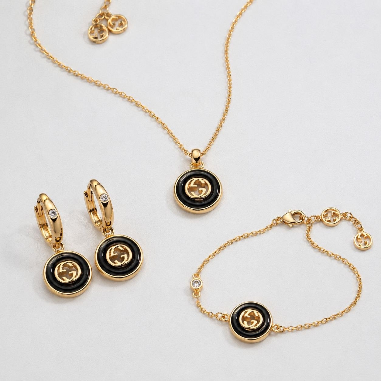 GG Black Medallion Drop Earrings