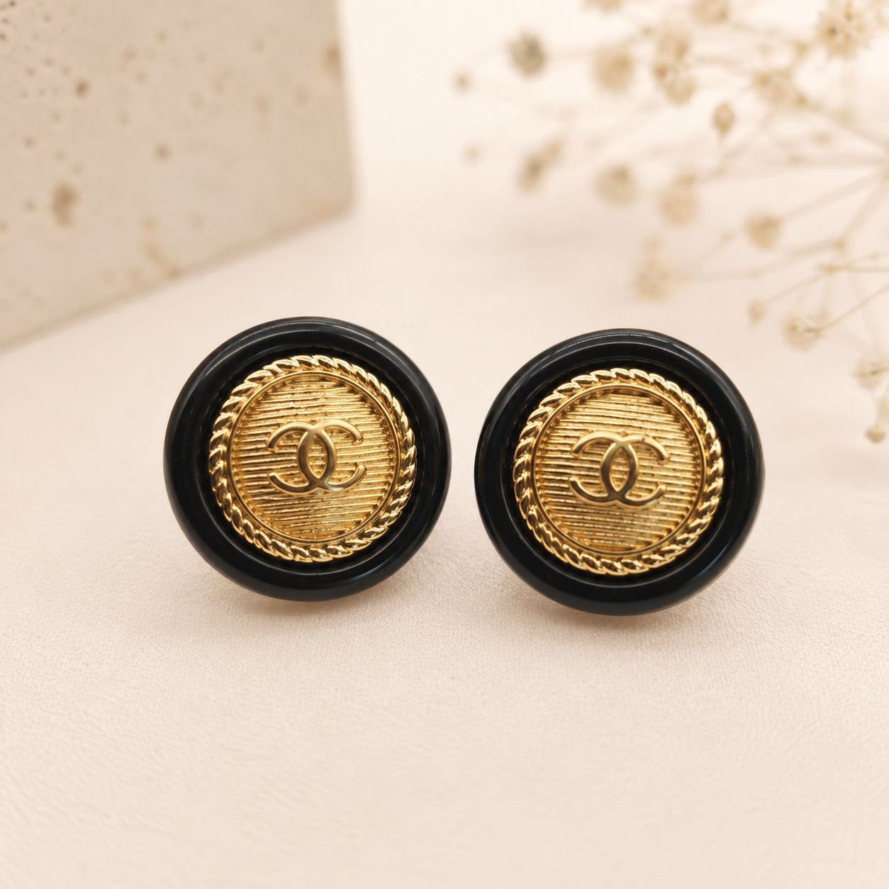 CC Black & Gold Medallion Stud Earrings